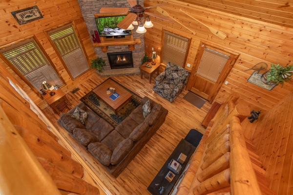 Looking down into the living room at Mountain Adventure, a 2 bedroom cabin rental located in Pigeon Forge