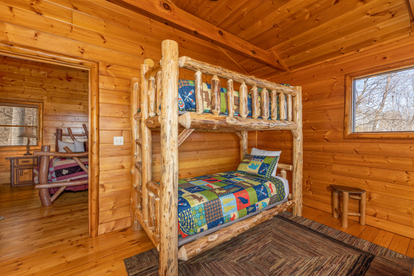Bunk beds at Mountain Adventure, a 2 bedroom cabin rental located in Pigeon Forge