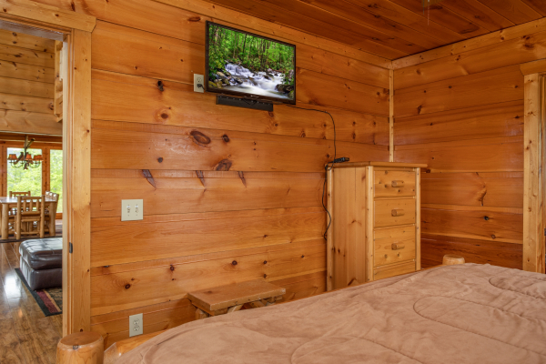 Dresser and TV in a bedroom at Mountain Bliss, a 2 bedroom cabin rental located in Pigeon Forge