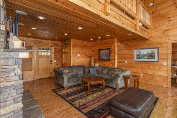 Sectional sofa in the living room at Mountain Bliss, a 2 bedroom cabin rental located in Pigeon Forge