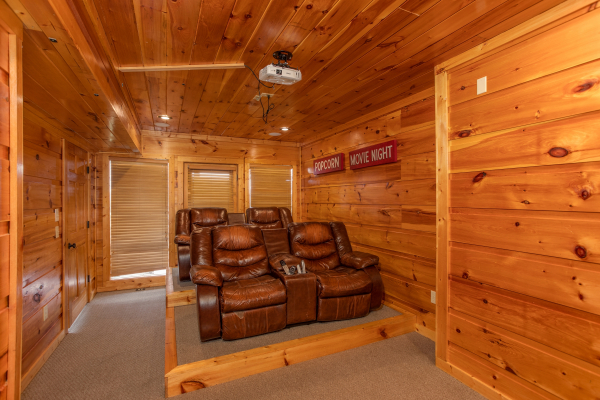 Theater room seating at Mountain Bliss, a 2 bedroom cabin rental located in Pigeon Forge