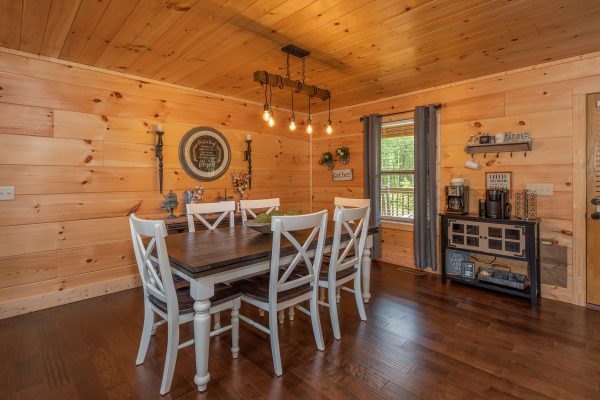 Dining table for six at Always Dream'n, a 6 bedroom cabin rental located in Pigeon Forge