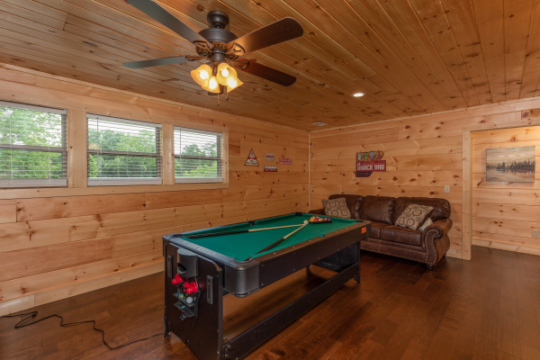Convertible pool table in the game room at Always Dream'n, a 6 bedroom cabin rental located in Pigeon Forge