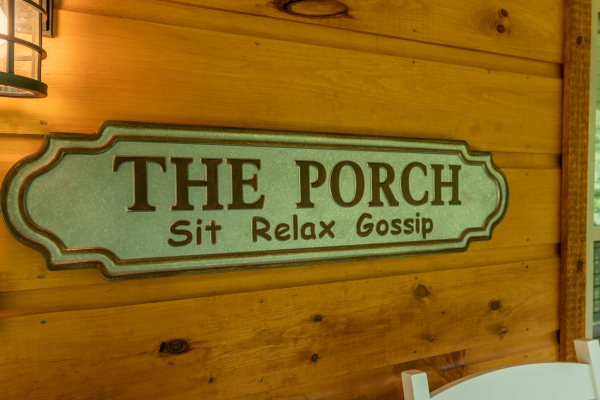 Porch sign at Always Dream'n, a 6 bedroom cabin rental located in Pigeon Forge