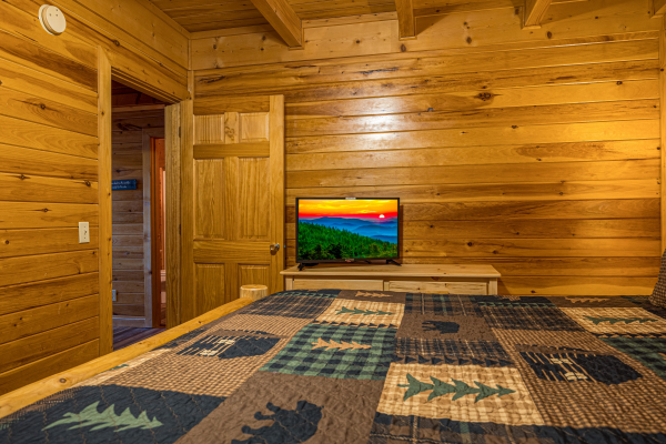 Tv in the bedroom at Top Of The Way, a 2 bedroom cabin rental located in pigeon forge