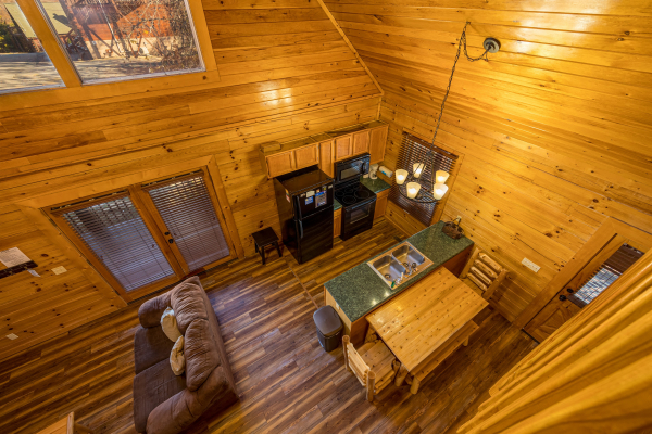 Kitchen view from loft at Top Of The Way, a 2 bedroom cabin rental located in pigeon forge