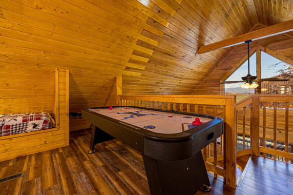 Air Hockey and View From Loft  Top Of The Way, a 2 bedroom cabin rental located in pigeon forge
