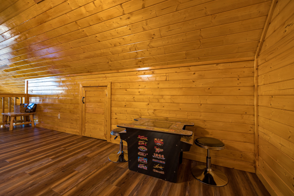 Arcade at Top Of The Way, a 2 bedroom cabin rental located in pigeon forge