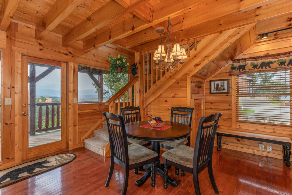 Dining table for 4 at 1 Above the Smokies, a 2 bedroom cabin rental located in Pigeon Forge