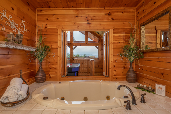 Jacuzzi in a bathroom at 1 Above the Smokies, a 2 bedroom cabin rental located in Pigeon Forge