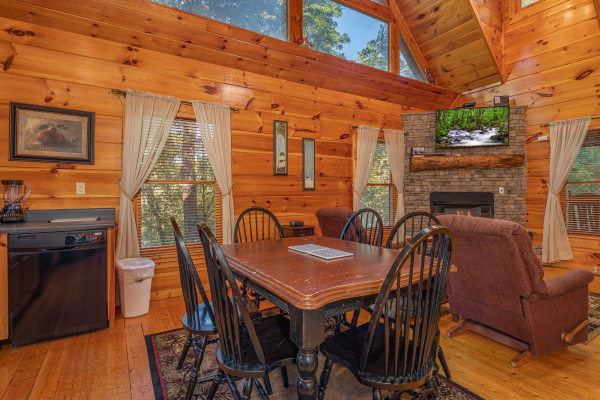 Dining table for six at Firefly Ridge, a 2 bedroom cabin rental located in Pigeon Forge
