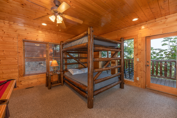 Bunk beds at Rocky Top Retreat, a 2 bedroom cabin rental located in Pigeon Forge