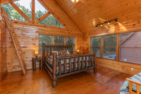 Multiple beds in the loft space at Rocky Top Retreat, a 2 bedroom cabin rental located in Pigeon Forge