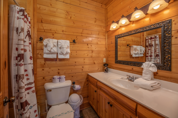 Bathroom with a tub and shower at Rocky Top Retreat, a 2 bedroom cabin rental located in Pigeon Forge