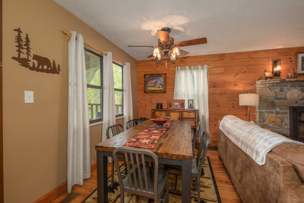 Dining table for six at Misty Mountain Sunrise, a 3 bedroom cabin rental located in Pigeon Forge