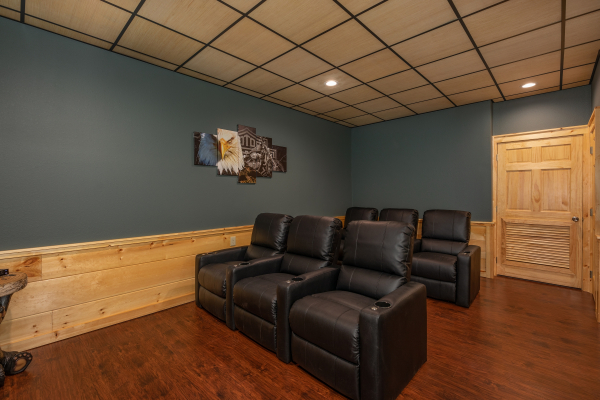 Seating in the theater room at Gar Bear's Hideaway, a 3 bedroom cabin rental located in Pigeon Forge