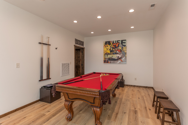 Pool table in a game room at Mountain Celebration, a 4 bedroom cabin rental located in Gatlinburg