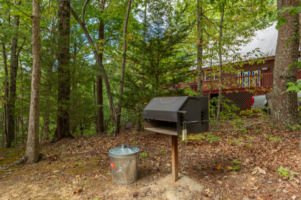 Charcoal grill in the yard at Yes, Deer, a 2 bedroom cabin rental located in Pigeon Forge