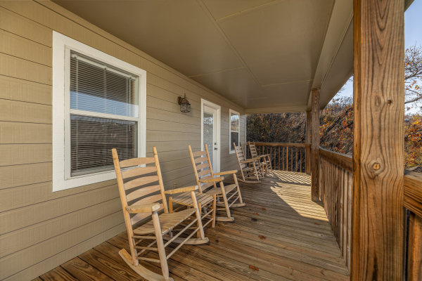 Deck with rocking chairs at Le Bear Chalet, a 7 bedroom cabin rental located in Gatlinburg