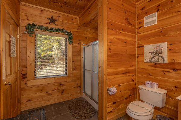Shower in a bathroom at Mountain Mama, a 3 bedroom cabin rental located in Pigeon Forge
