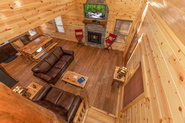 Looking down into the living room at Pinot Splash, a 4 bedroom cabin rental located in Gatlinburg