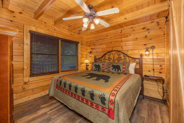 King bedroom at Loving Every Minute, a 5 bedroom cabin rental located in Pigeon Forge