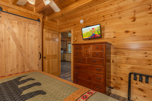 TV in king room  at Loving Every Minute, a 5 bedroom cabin rental located in Pigeon Forge