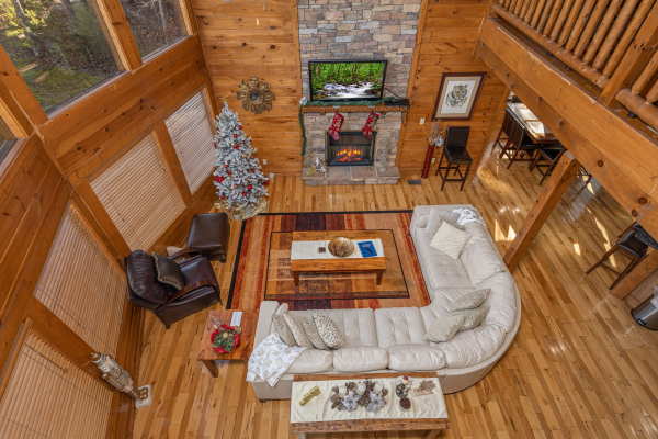 Looking down at the living room at King of the Mountain, a 3 bedroom cabin rental located in Pigeon Forge