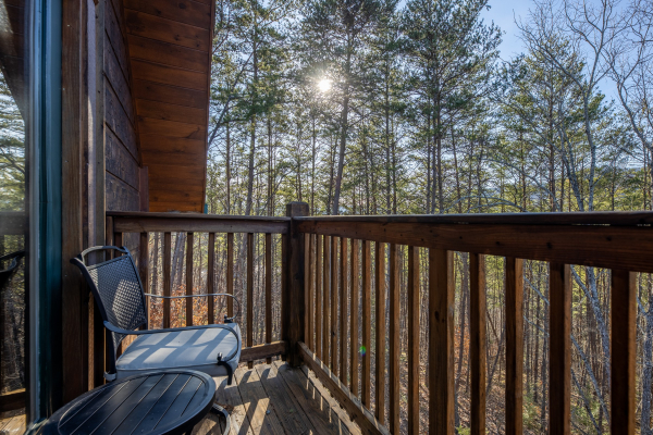 Forest views from the deck at King of the Mountain, a 3 bedroom cabin rental located in Pigeon Forge