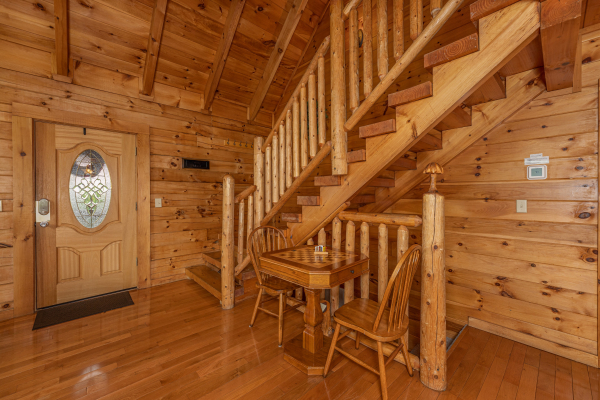 Foyer with table for two at Logged Inn, a 3 bedroom cabin rental located in Pigeon Forge