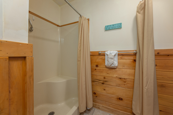 Large walk in shower at Logged Inn, a 3 bedroom cabin rental located in Pigeon Forge