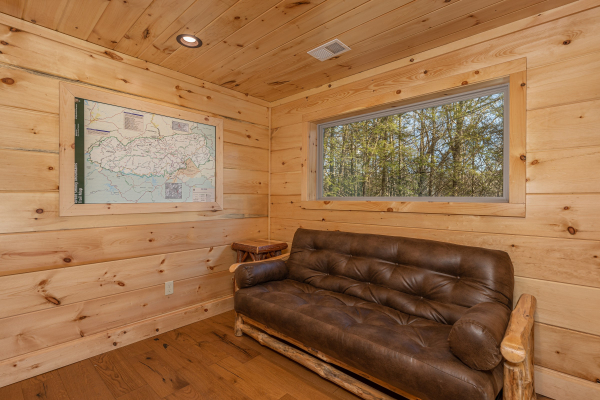 Futon in the loft space at Bessy Bears Cabin, a 2 bedroom cabin rental located inGatlinburg