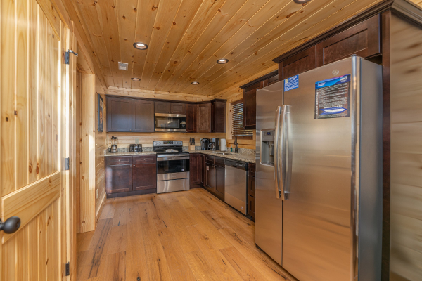 Kitchen with stainless appliances at Bessy Bears Cabin, a 2 bedroom cabin rental located inGatlinburg