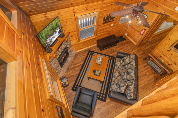 Looking down at the living room at Moonlit Pines, a 2 bedroom cabin rental located in Pigeon Forge