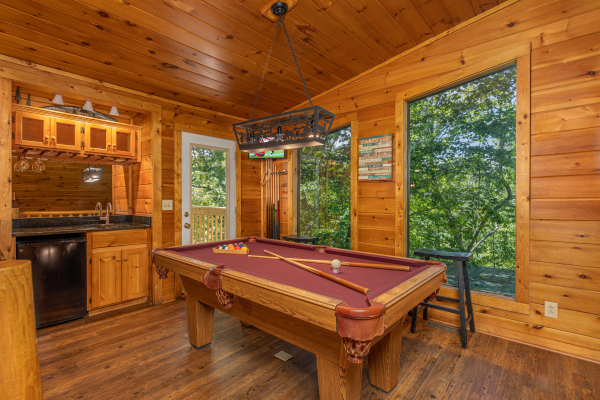 Pool table at Moonlit Pines, a 2 bedroom cabin rental located in Pigeon Forge