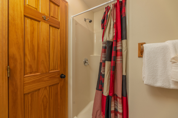 Bathroom with a shower at Pool Side Lodge, a 6 bedroom cabin rental located in Pigeon Forge