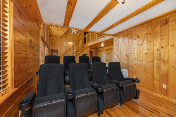 Theater room seating at Pool Side Lodge, a 6 bedroom cabin rental located in Pigeon Forge