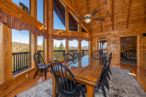 Dining table at Mountain Laurel Lodge, a 4 bedroom cabin rental located in Pigeon Forge