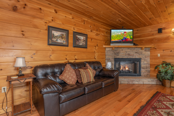 Game room seating at Mountain Laurel Lodge, a 4 bedroom cabin rental located in Pigeon Forge