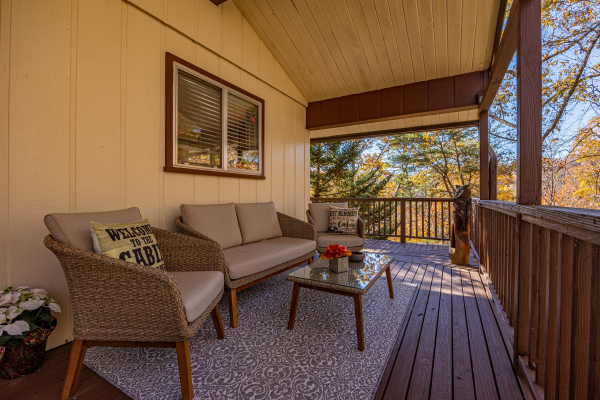 Deck furniture at Buena Vista Getaway, a 3 bedroom cabin rental located in gatlinburg