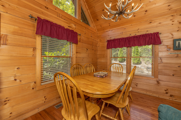 Dining table for six at Cub's Crossing, a 3 bedroom cabin rental located in Gatlinburg