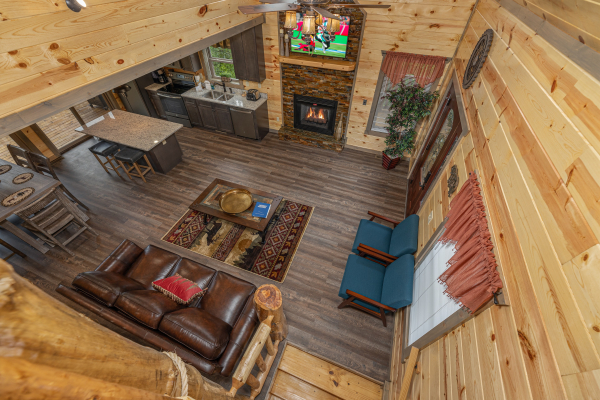 Looking down at the living room at Alpine Adventure, a 4 bedroom cabin rental located in Pigeon Forge