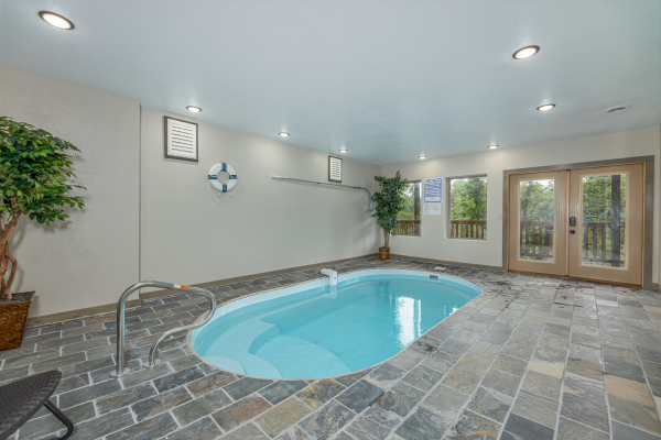 Indoor pool at Alpine Adventure, a 4 bedroom cabin rental located in Pigeon Forge