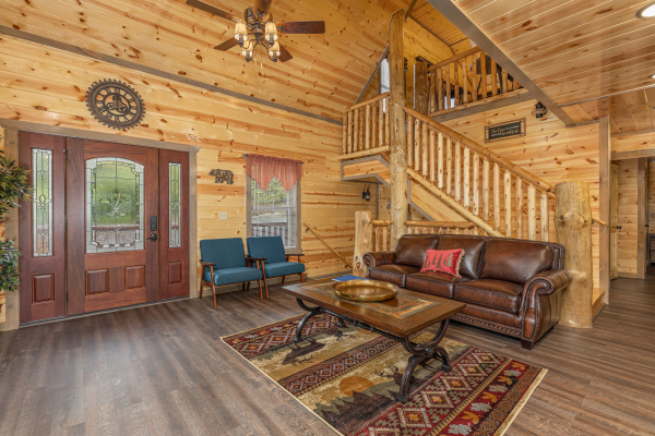 Sofa and two chairs in a living room at Alpine Adventure, a 4 bedroom cabin rental located in Pigeon Forge