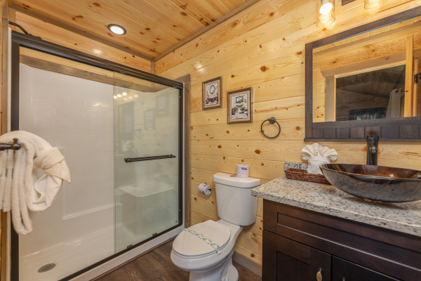 Bathroom with a walk in shower at Alpine Adventure, a 4 bedroom cabin rental located in Pigeon Forge