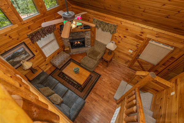 Looking down at the living room at Bearway to Heaven, a 2 bedroom cabin rental located in Gatlinburg