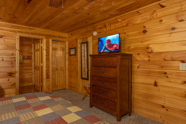 Dresser and TV in a bedroom at Bearway to Heaven, a 2 bedroom cabin rental located in Gatlinburg