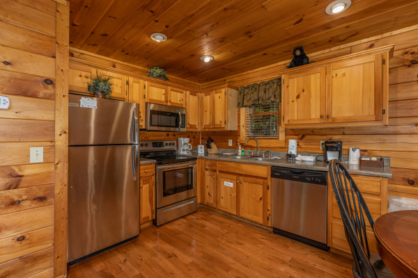 Kitchen with stainless appliances at Bearway to Heaven, a 2 bedroom cabin rental located in Gatlinburg