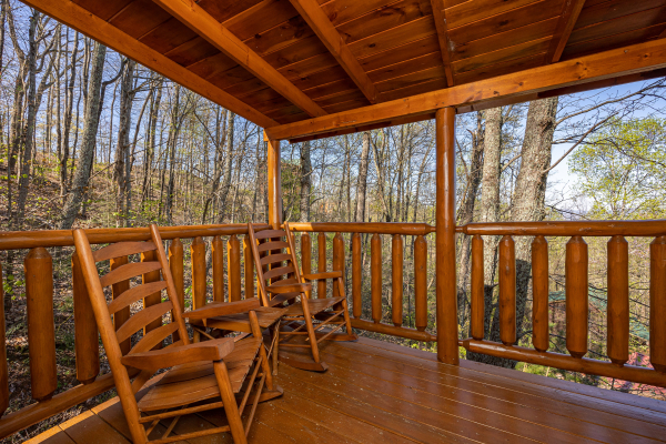 Outdoor seating for two at Bearway to Heaven, a 2 bedroom cabin rental located in Gatlinburg
