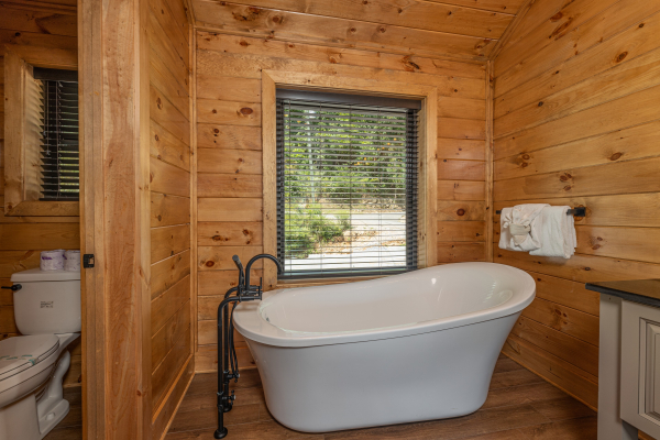 Soaker tub in a bathroom at Black Bears & Biscuits Lodge, a 6 bedroom cabin rental located in Pigeon Forge